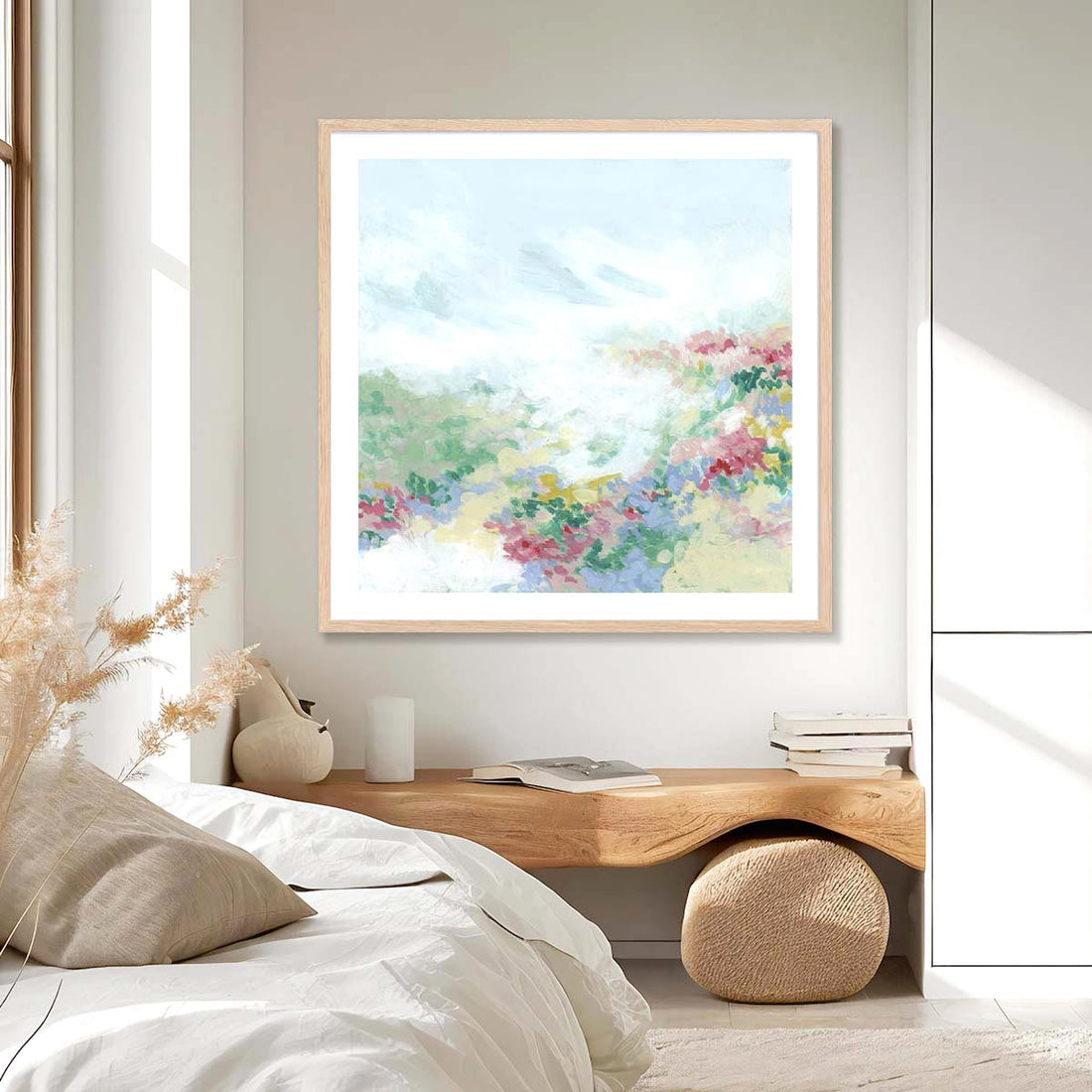 Cozy bedroom with a large peaceful botanical wall art in oak frame.